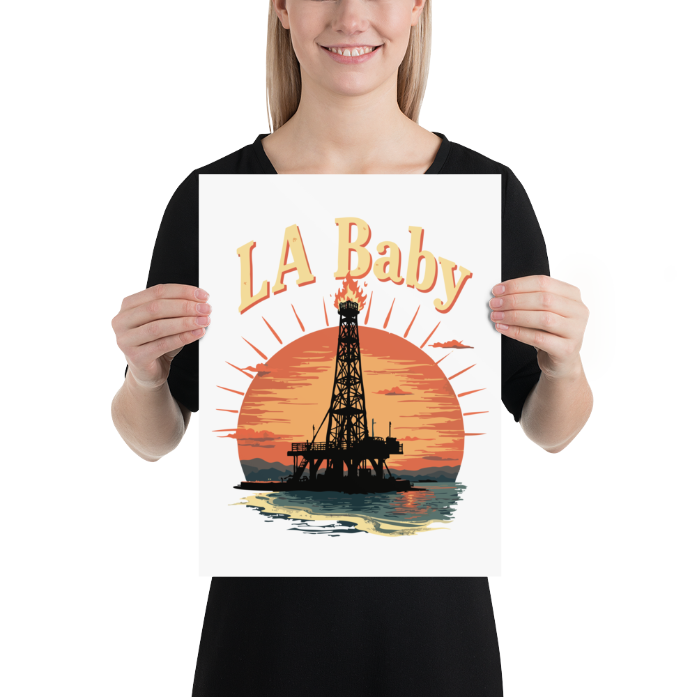 Product mockup - A design depicting a crumbling oil rig on the shore of Los Angeles at sunset. Text - LA Baby  enhanced-matte-paper-poster-_in_-12x16