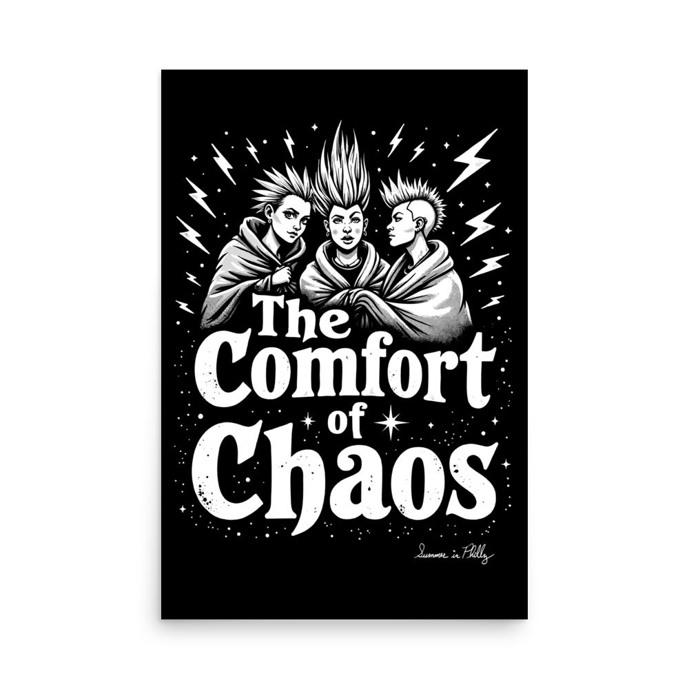 Product mockup Three girl punks are wrapped in comfy looking blankets. They have spiky hair and the one with the undercut has a trans tattoo on their neck.  Design is Black, white, and gray. Text: “The Comfort of Chaos”  enhanced-matte-paper-poster-_in_-24x36-